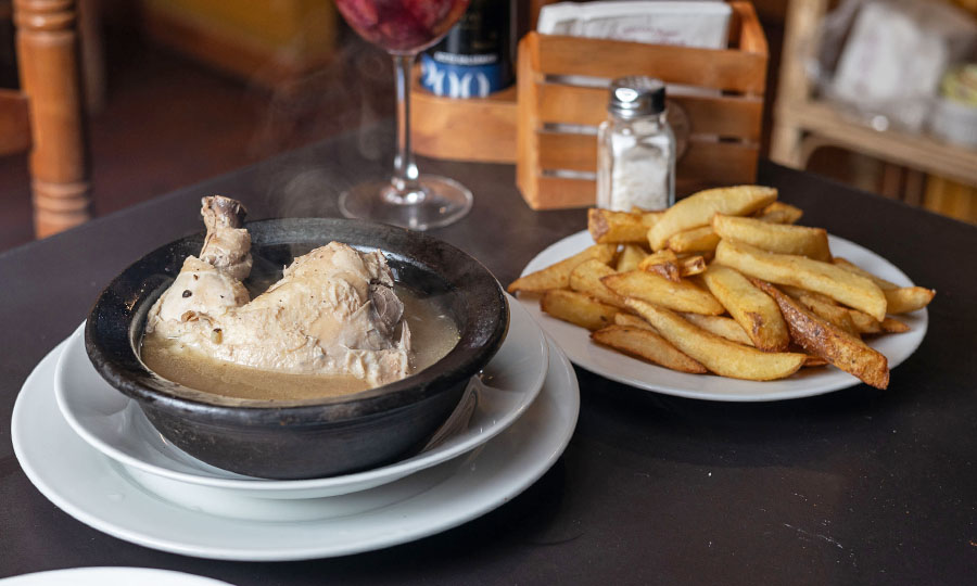 Pollo al coac con papas fritas