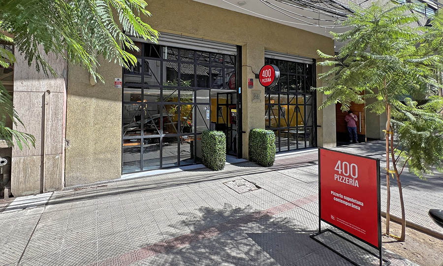 Fachada del nuevo local de 400 Pizzería en General Flores
