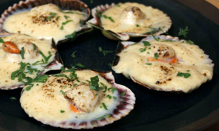 Ostiones cremosos estilo parmesana - Caleta de Locos